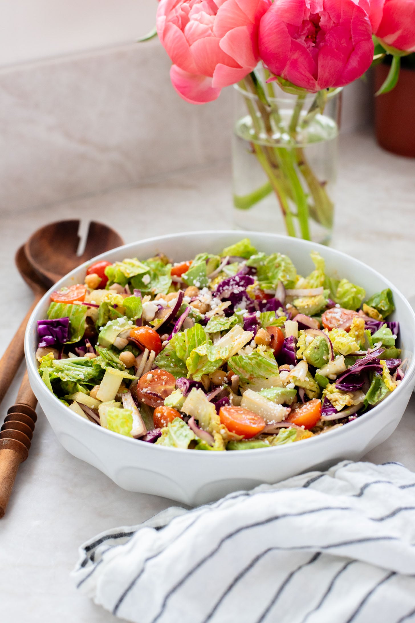 This Chipotle Chickpea Chopped Salad is a quick & easy meal that is packed with fresh veggies, a smoky chipotle dressing and chickpeas | ThisSavoryVegan.com