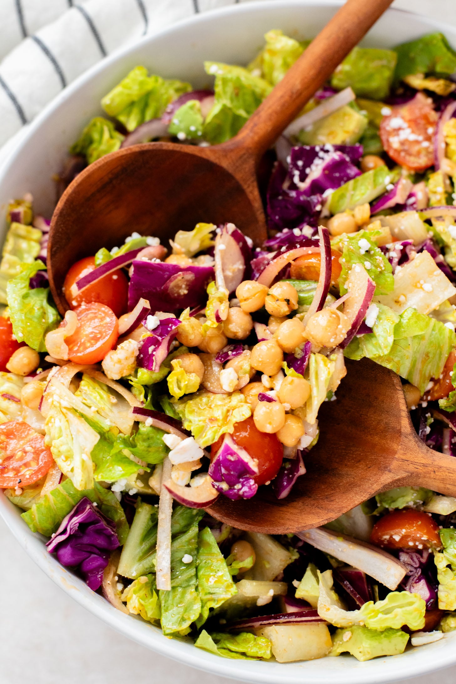 This Chipotle Chickpea Chopped Salad is a quick & easy meal that is packed with fresh veggies, a smoky chipotle dressing and chickpeas | ThisSavoryVegan.com