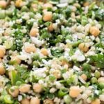 This Spring Pea Couscous Salad is filled with fresh herbs, English peas, chickpeas, pearl couscous and a delicious lemon dressing | ThisSavoryVegan.com