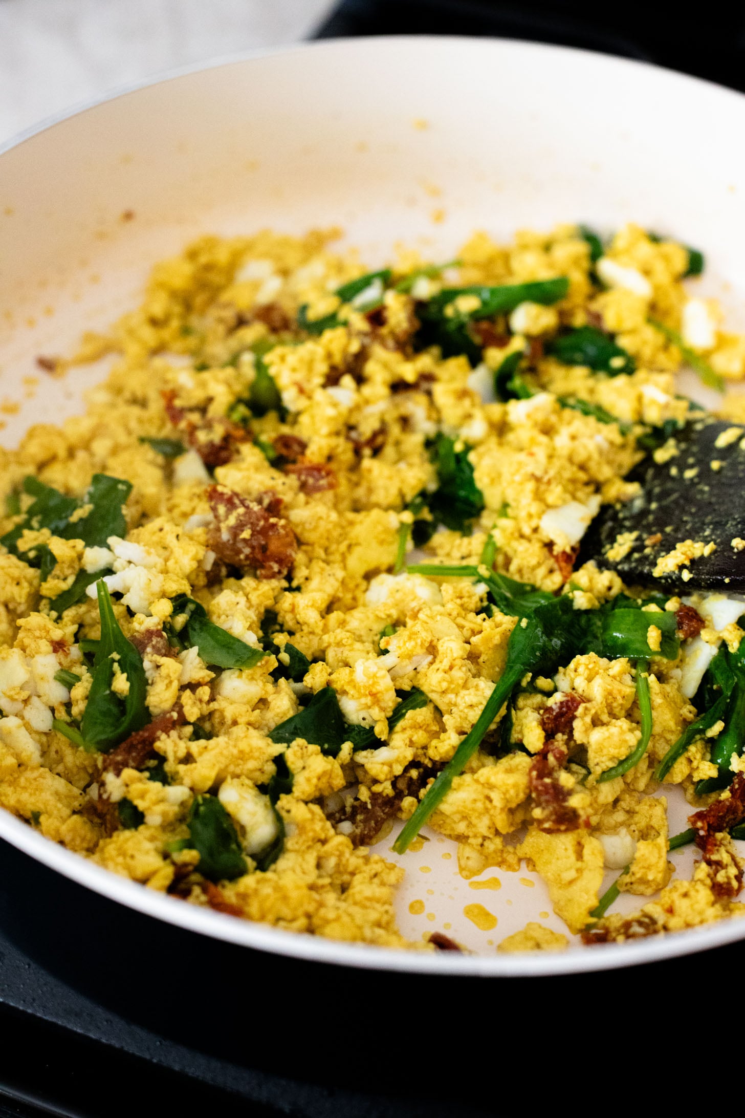 These Tofu Scramble Breakfast Wraps are a play on the Starbucks feta egg white wrap - but made dairy-free & with tofu | ThisSavoryVegan.com