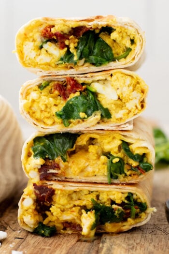These Tofu Scramble Breakfast Wraps are a play on the Starbucks feta egg white wrap - but made dairy-free & with tofu | ThisSavoryVegan.com