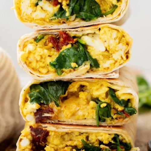 These Tofu Scramble Breakfast Wraps are a play on the Starbucks feta egg white wrap - but made dairy-free & with tofu | ThisSavoryVegan.com