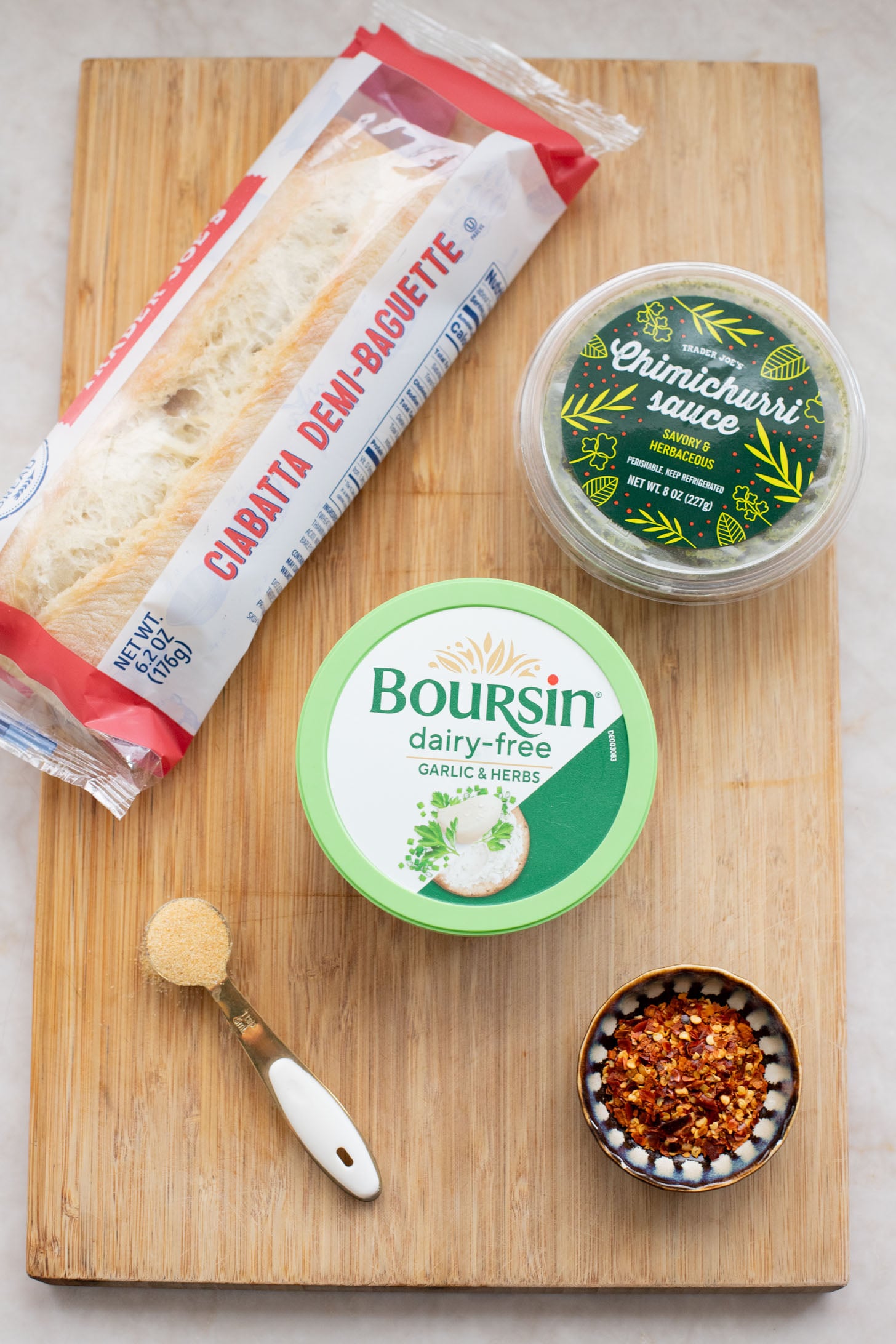 This Trader Joe's Cheesy Chimichurri Garlic Bread is the perfect vegan side dish. This is garlic bread on a whole other level | ThisSavoryVegan.com
