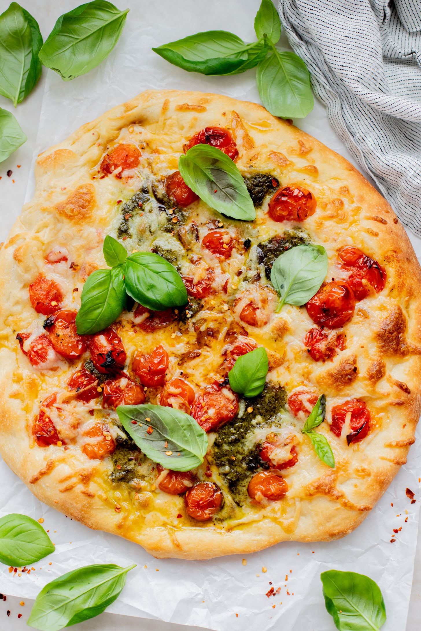 This Burst Tomato Pizza is 100% vegan and delicious! This pizza has simple ingredients but packs in TONS of flavor | ThisSavoryVegan.com
