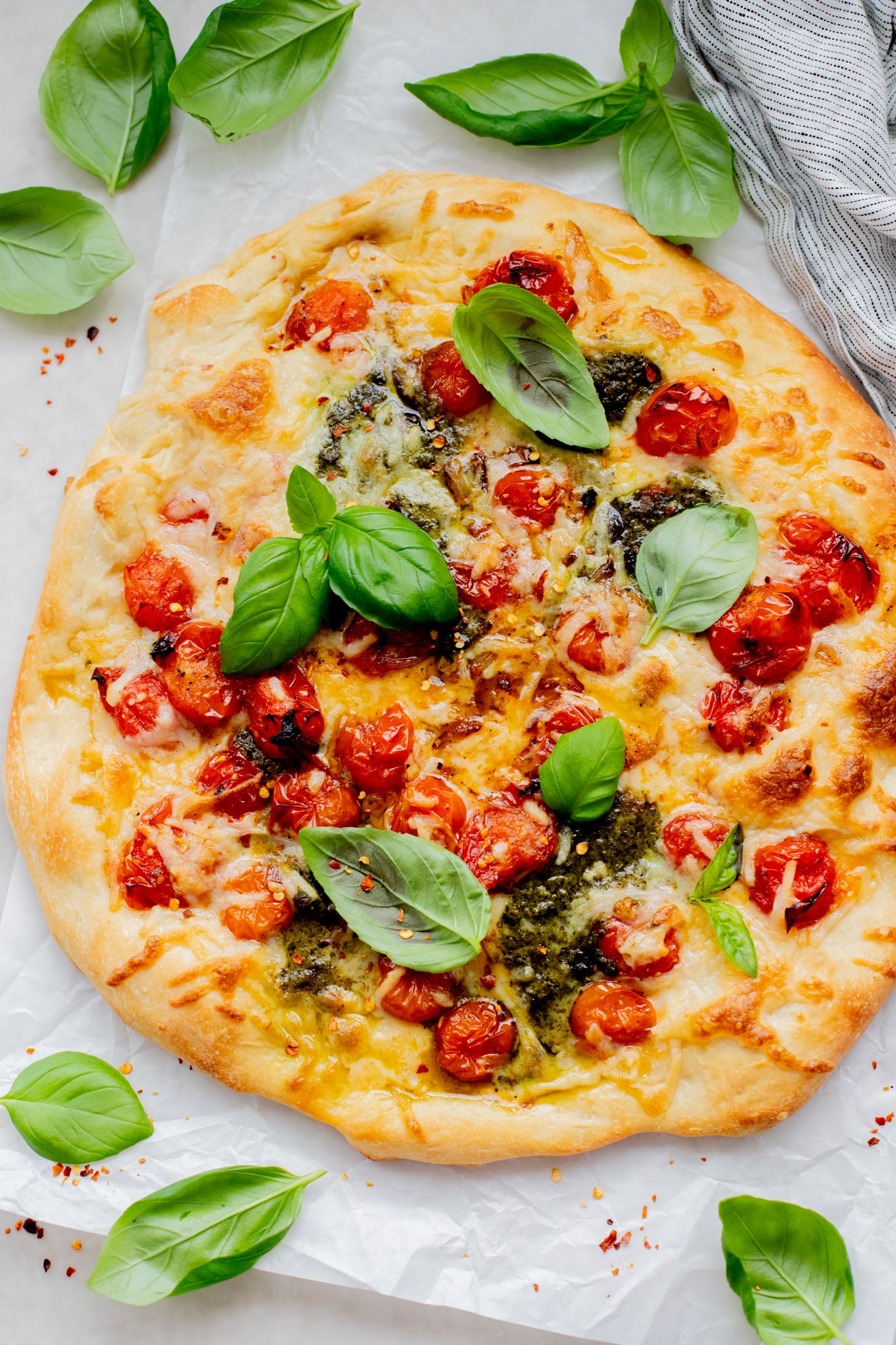 This Burst Tomato Pizza is 100% vegan and delicious! This pizza has simple ingredients but packs in TONS of flavor | ThisSavoryVegan.com