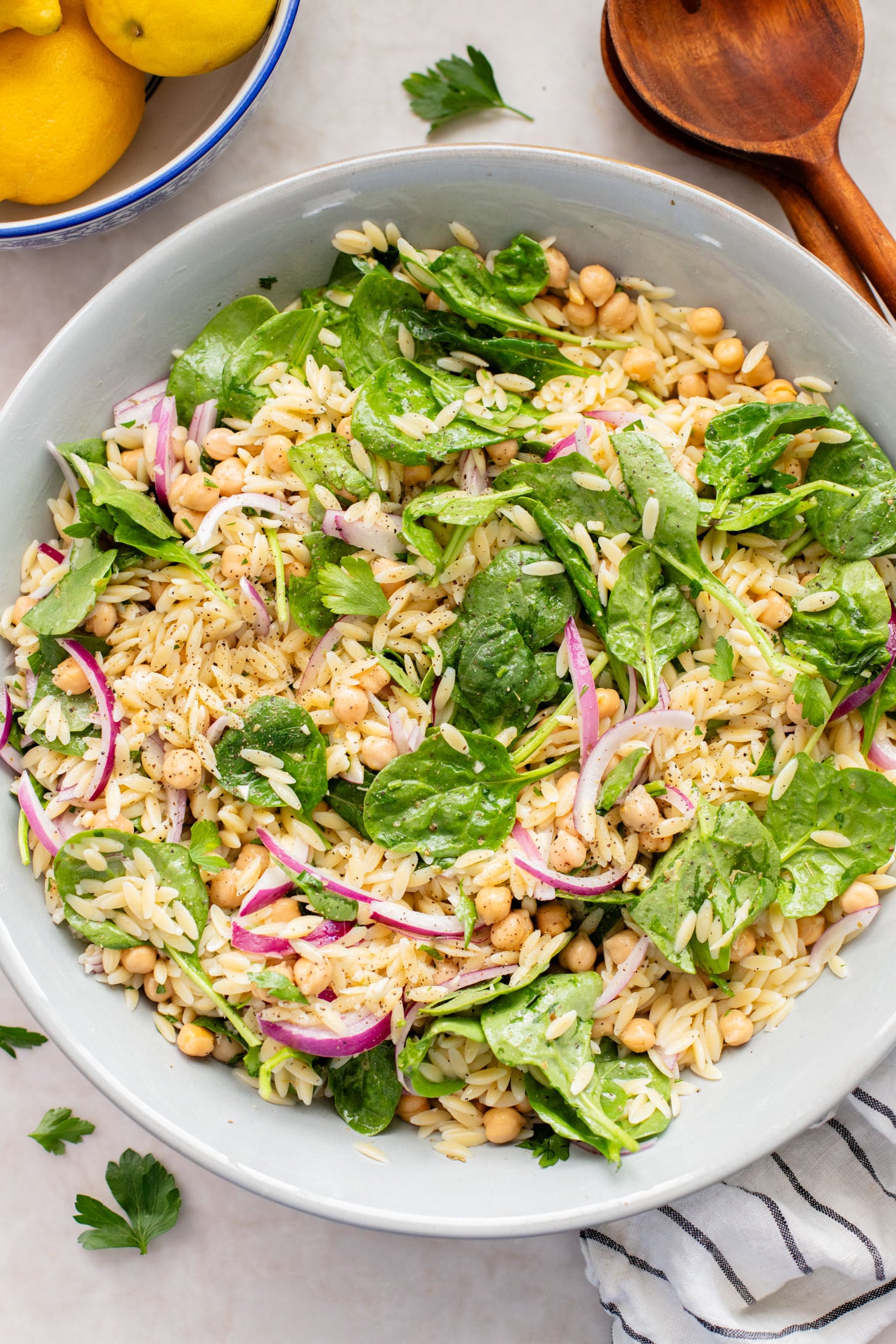 This Lemon Orzo Pasta Salad has light, fresh flavors, plus plenty of greens. The perfect vegan pasta salad for the warmer months | ThisSavoryVegan.com