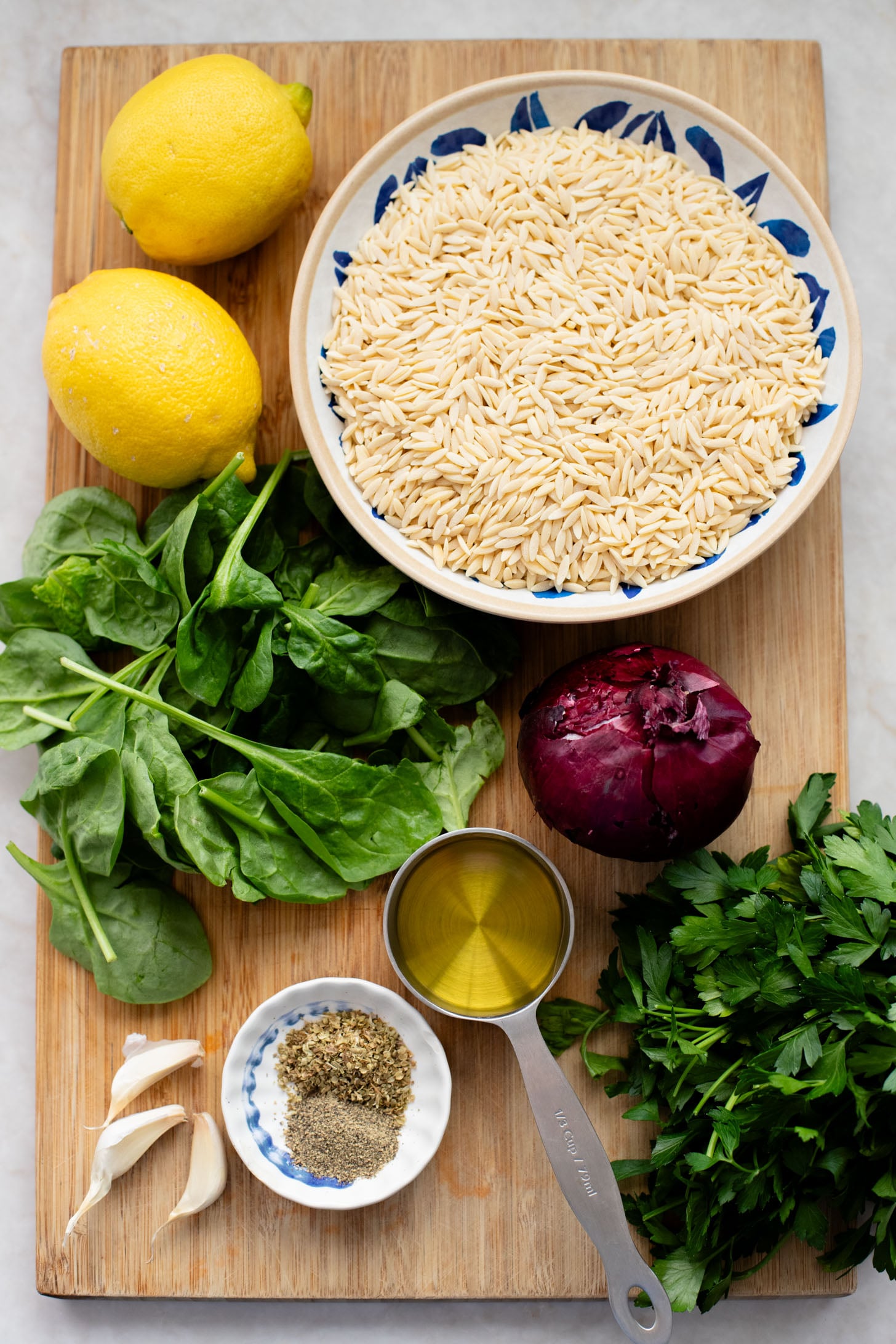 This Lemon Orzo Pasta Salad has light, fresh flavors, plus plenty of greens. The perfect vegan pasta salad for the warmer months | ThisSavoryVegan.com