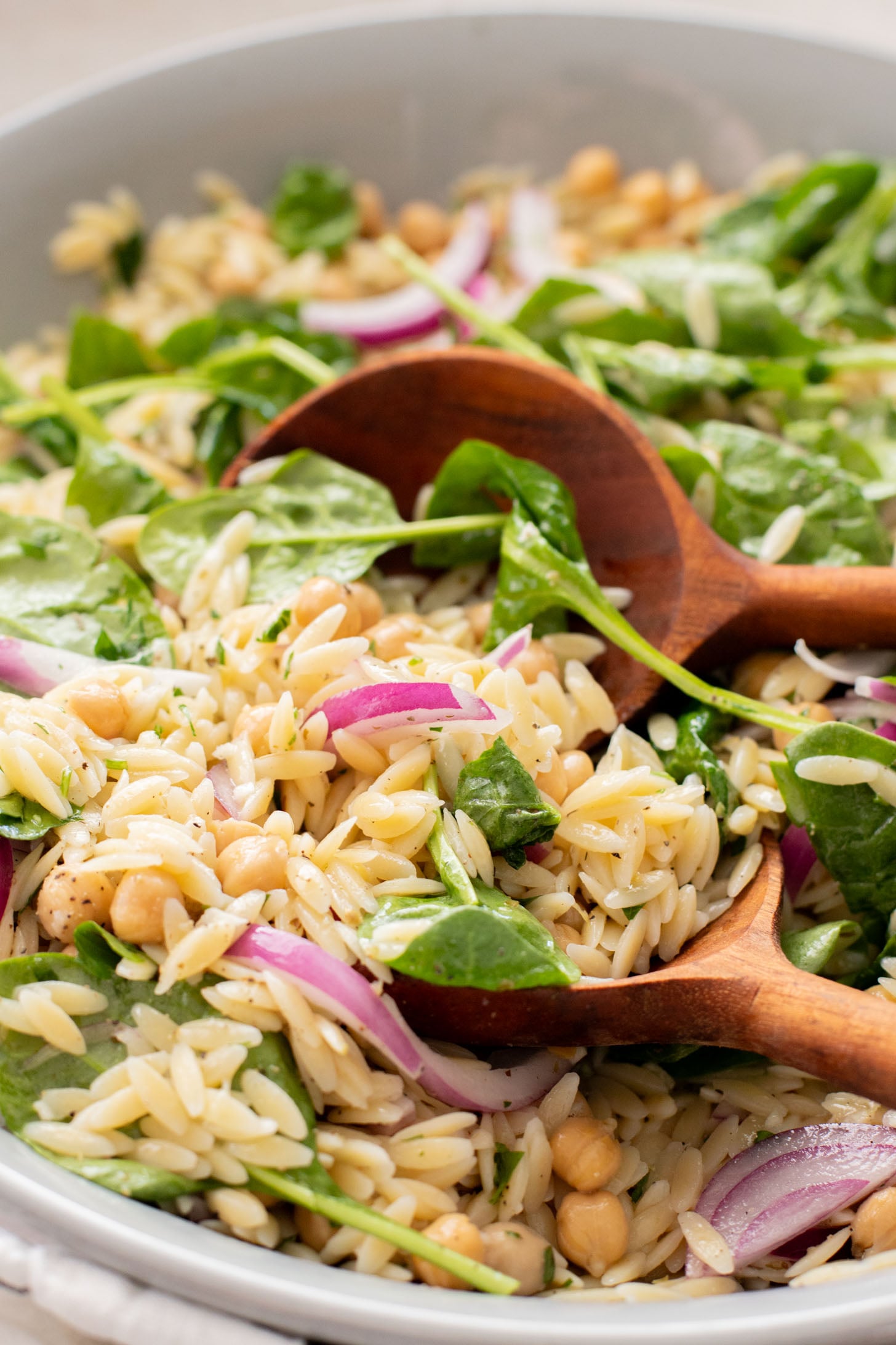 This Lemon Orzo Pasta Salad has light, fresh flavors, plus plenty of greens. The perfect vegan pasta salad for the warmer months | ThisSavoryVegan.com