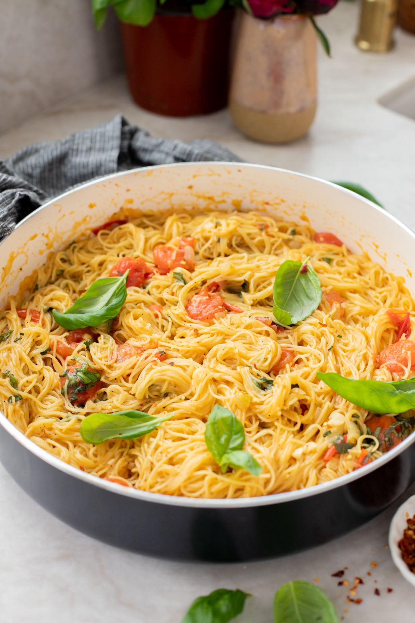 This Summer Capellini is a one-pot vegan pasta dish that is simple but packed with flavor from cherry tomatoes & garlic | ThisSavoryVegan.com
