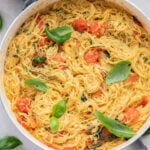 This Summer Capellini is a one-pot vegan pasta dish that is simple but packed with flavor from cherry tomatoes & garlic | ThisSavoryVegan.com