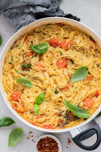 This Summer Capellini is a one-pot vegan pasta dish that is simple but packed with flavor from cherry tomatoes & garlic | ThisSavoryVegan.com