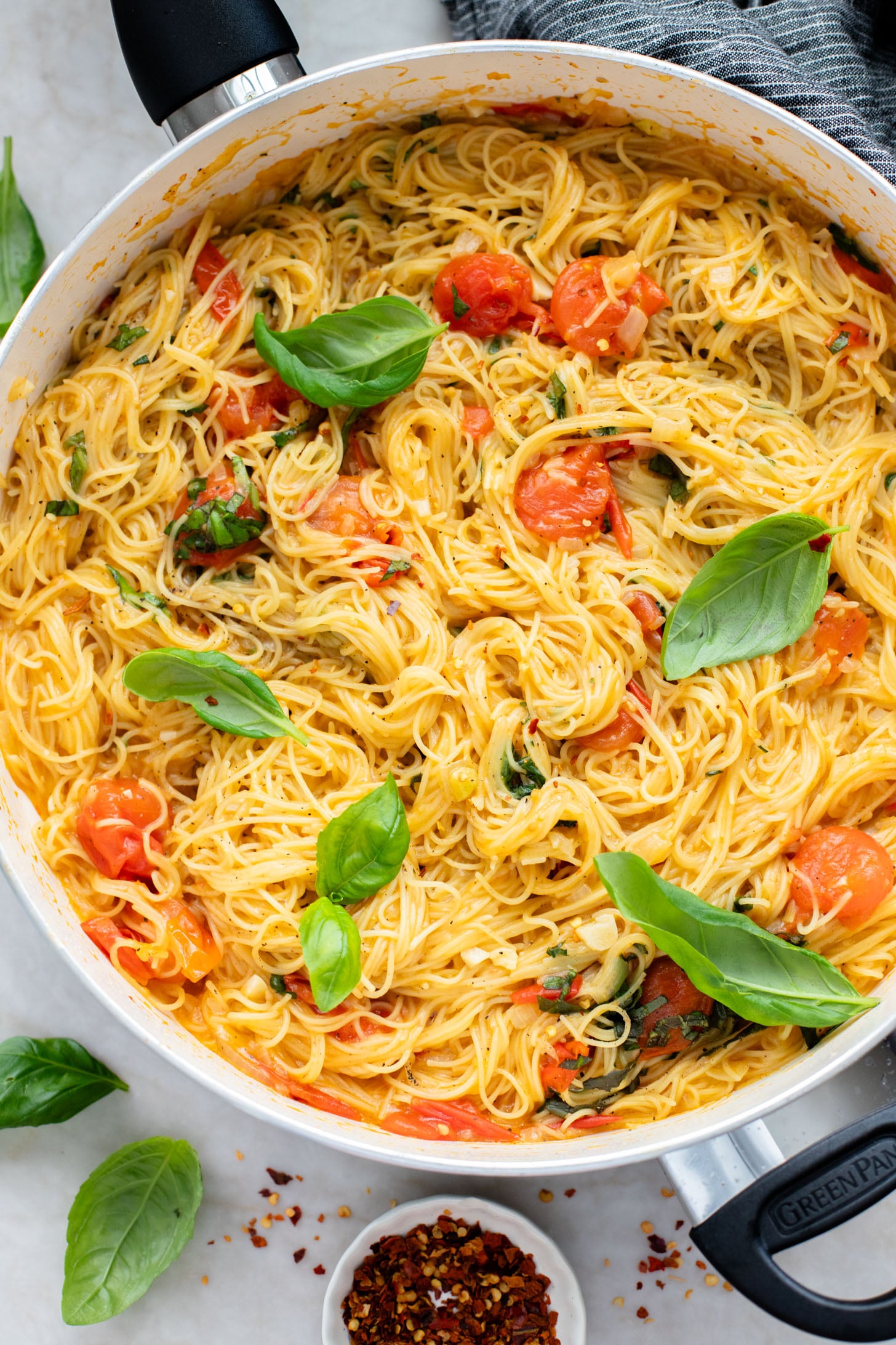 This Summer Capellini is a one-pot vegan pasta dish that is simple but packed with flavor from cherry tomatoes & garlic | ThisSavoryVegan.com