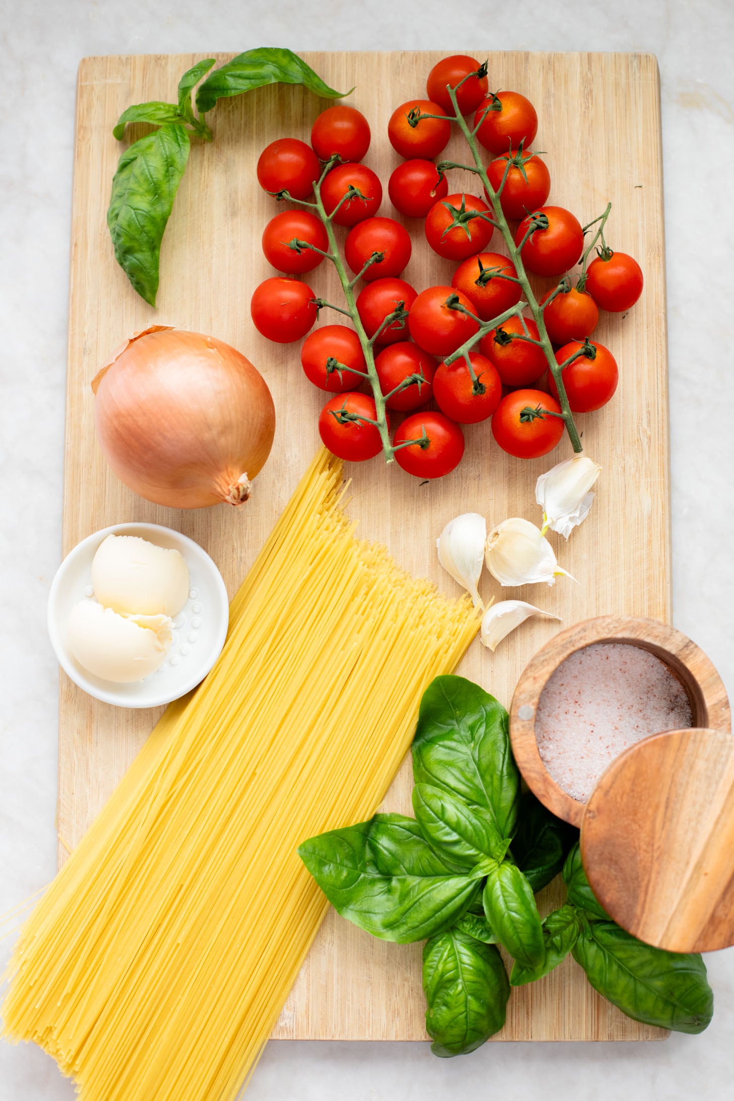 This Summer Capellini is a one-pot vegan pasta dish that is simple but packed with flavor from cherry tomatoes & garlic | ThisSavoryVegan.com