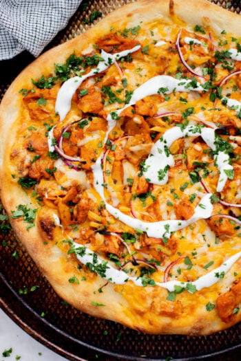 This Vegan Buffalo Chicken Pizza has the perfect amount of spice, crunch and tang. The vegan ranch mellows the spice for the perfect bite | ThisSavoryVegan.com