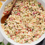This Vegan Macaroni Salad is a lighter, vegan version of a classic BBQ staple. This is a total crowd pleaser you will want to take to every party | ThisSavoryVegan.com