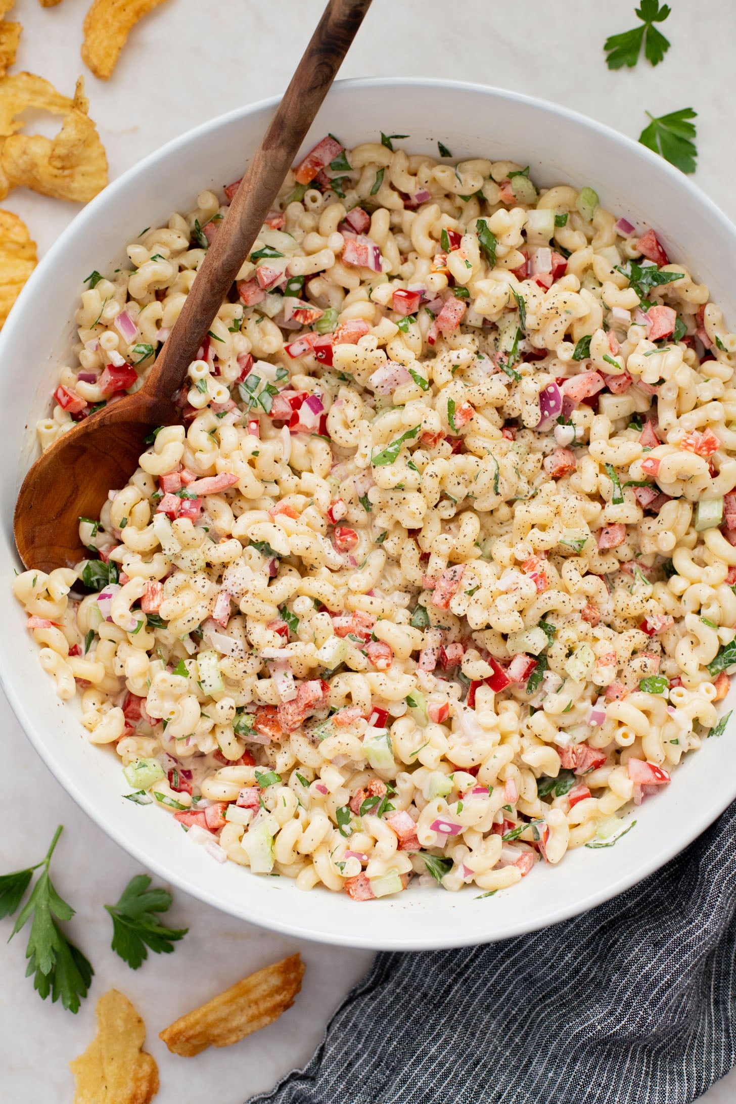 This Vegan Macaroni Salad is a lighter, vegan version of a classic BBQ staple. This is a total crowd pleaser you will want to take to every party | ThisSavoryVegan.com
