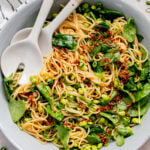 This Cold Edamame Noodle Salad is the perfect dinner when you want something fresh & comforting. Topped with chili crisp for a little heat & packed with plant protein | ThisSavoryVegan.com