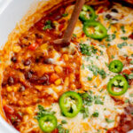 This Slow Cooker Enchilada Casserole is perfect when you want a veggie-packed dinner with minimal effort and without turning on the stove | ThisSavoryVegan.com