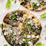 These Spinach & Feta Peta Pizzas are the perfect quick vegan dinner. Made with just a few ingredients and ready in less than 30 minutes. Kid-friendly too | ThisSavoryVegan.com