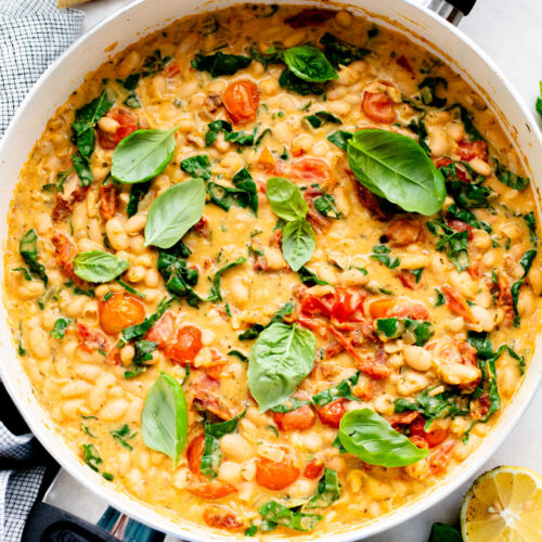 This Tuscan White Bean Skillet is an easy weeknight dinner that is dairy-free and super comforting - the whole family will love it | ThisSavoryVegan.com