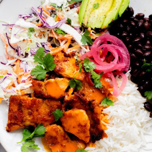 These Vegan Buffalo Chicken Plates are the perfect dinner - crispy buffalo "chicken" is loaded up with rice, beans & a dairy-free slaw | ThisSavoryVegan.com