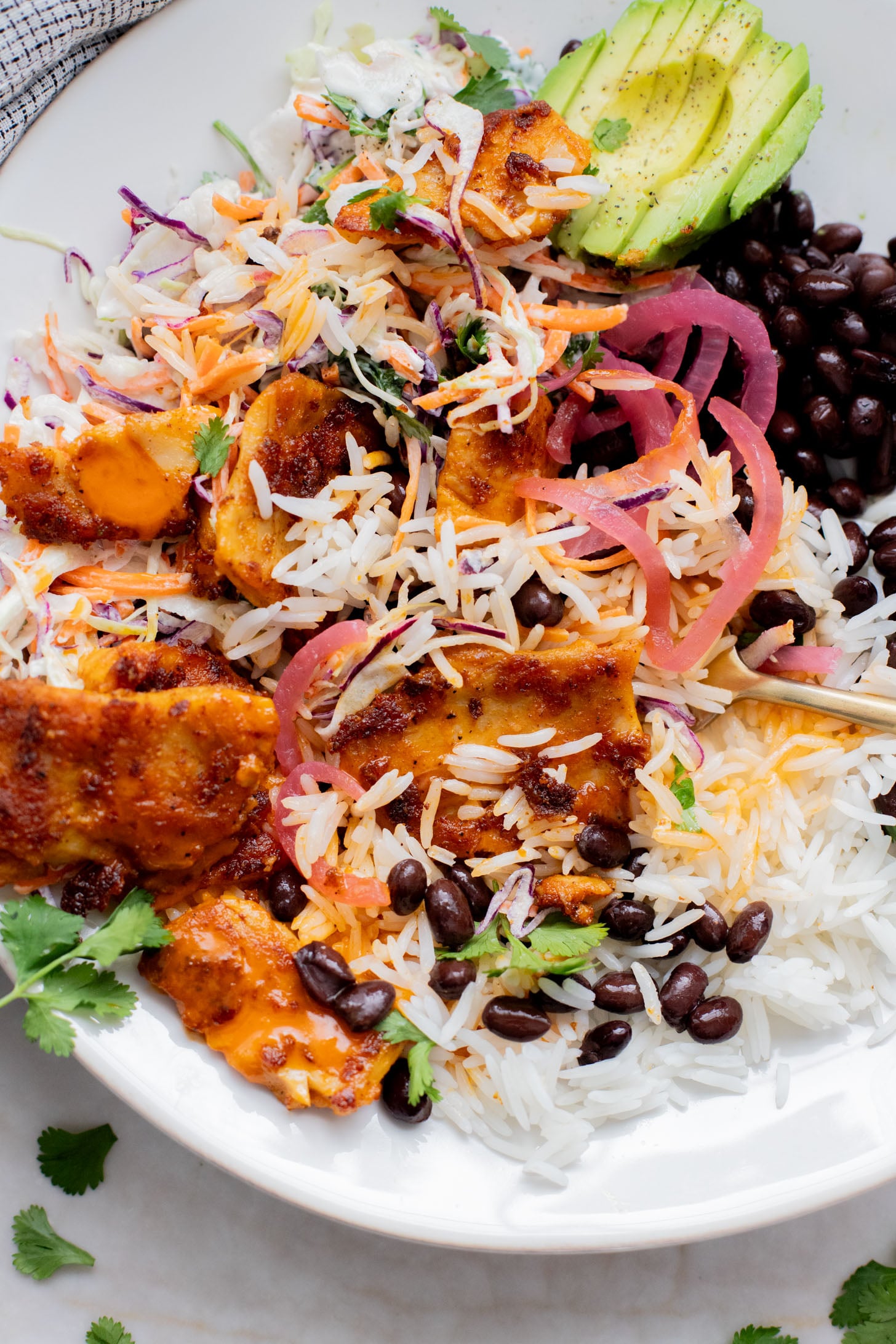 These Vegan Buffalo Chicken Plates are the perfect dinner - crispy buffalo "chicken" is loaded up with rice, beans & a dairy-free slaw | ThisSavoryVegan.com