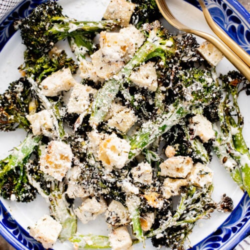 This Charred Broccolini Caesar Salad is a vegan dream - a creamy, dairy-free Caesar dressing, oven-roasted broccolini & garlic croutons | ThisSavoryVegan.com