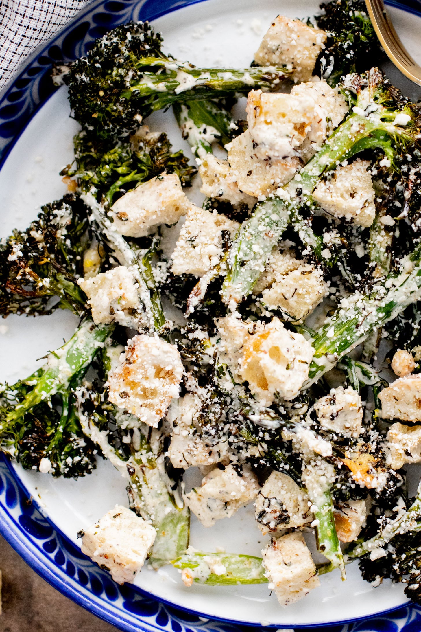 This Charred Broccolini Caesar Salad is a vegan dream - a creamy, dairy-free Caesar dressing, oven-roasted broccolini & garlic croutons | ThisSavoryVegan.com
