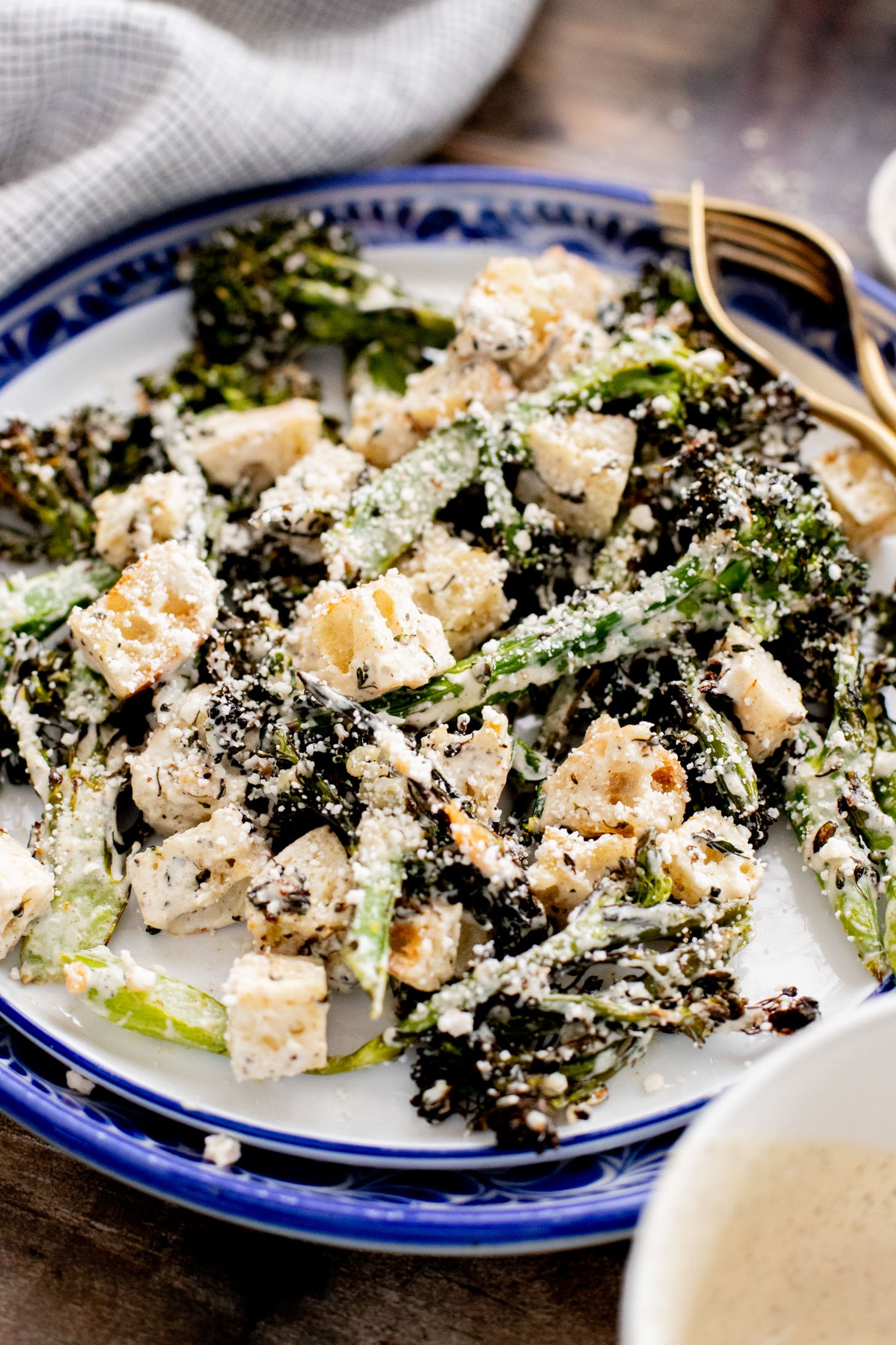 This Charred Broccolini Caesar Salad is a vegan dream - a creamy, dairy-free Caesar dressing, oven-roasted broccolini & garlic croutons | ThisSavoryVegan.com