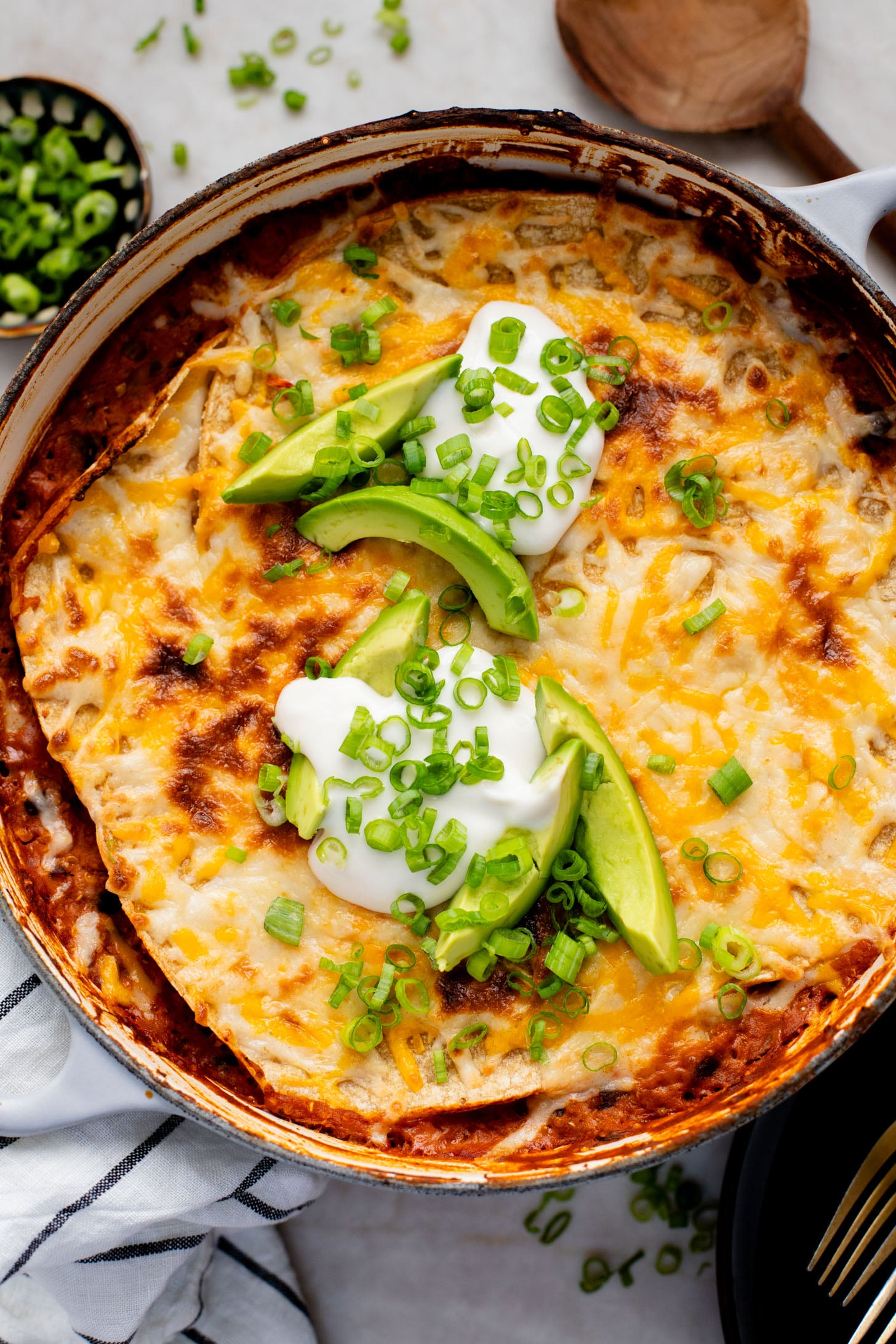 This High Protein Quinoa Enchilada Casserole is perfect for meal prep! Everything is cooked in one pot and each serving has 20+ grams of plant protein | ThisSavoryVegan.com