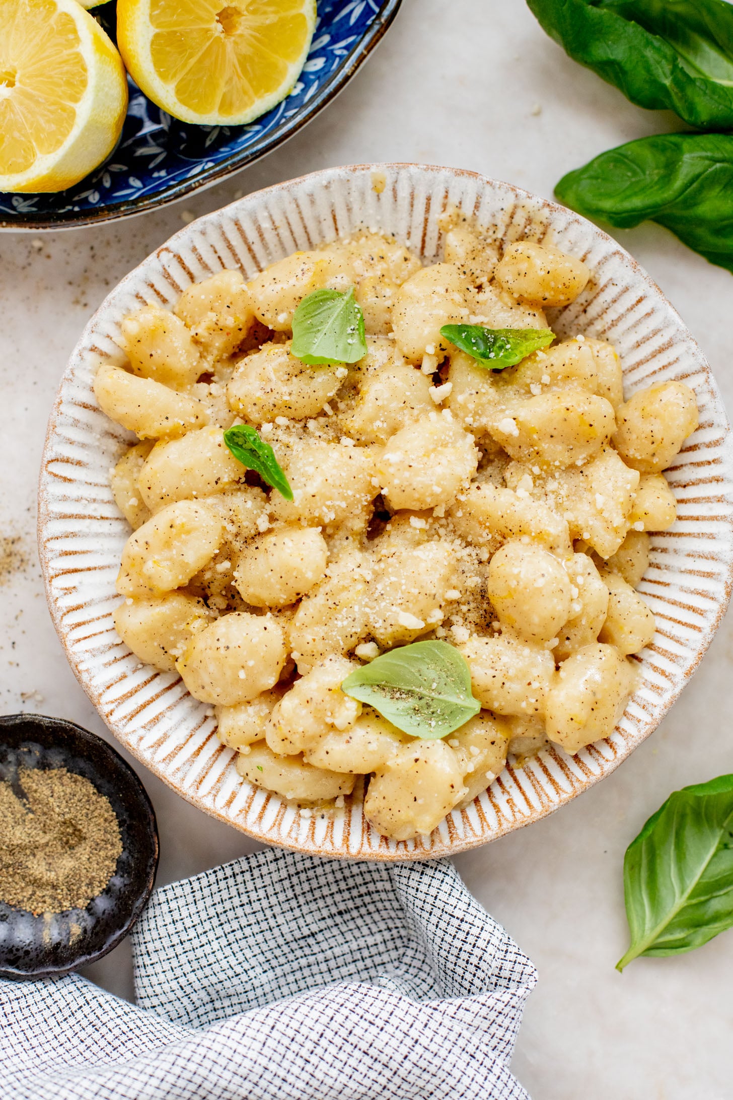 This Vegan Lemon Parmesan Gnocchi is a 20-minute dinner that has simple ingredients and bright, fresh flavors | ThisSavoryVegan.com