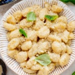 This Vegan Lemon Parmesan Gnocchi is a 20-minute dinner that has simple ingredients and bright, fresh flavors | ThisSavoryVegan.com