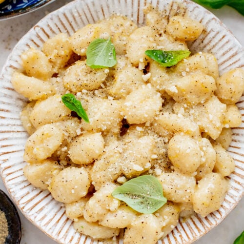This Vegan Lemon Parmesan Gnocchi is a 20-minute dinner that has simple ingredients and bright, fresh flavors | ThisSavoryVegan.com