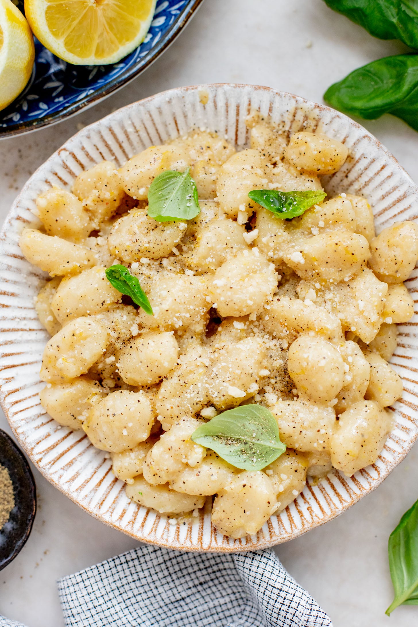 This Vegan Lemon Parmesan Gnocchi is a 20-minute dinner that has simple ingredients and bright, fresh flavors | ThisSavoryVegan.com