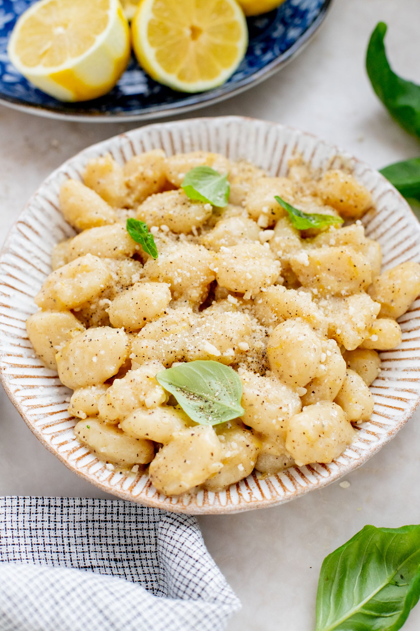 This Vegan Lemon Parmesan Gnocchi is a 20-minute dinner that has simple ingredients and bright, fresh flavors | ThisSavoryVegan.com