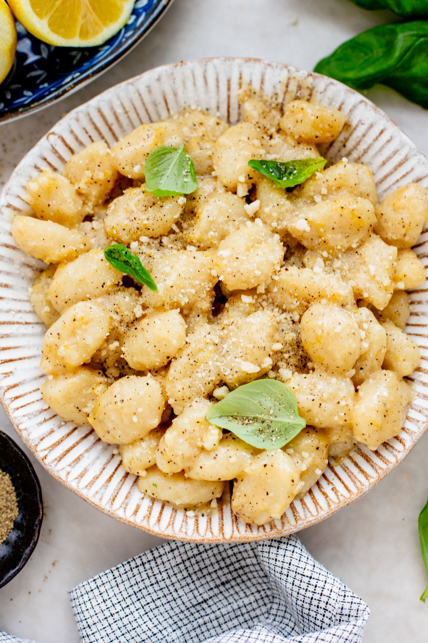 This Vegan Lemon Parmesan Gnocchi is a 20-minute dinner that has simple ingredients and bright, fresh flavors | ThisSavoryVegan.com