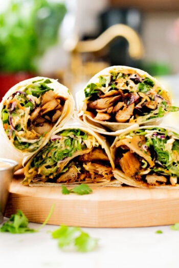 These Vegan Peanut Chicken Wraps are filled with crispy vegan chicken, crunchy veggies and the BEST spicy peanut sauce | ThisSavoryVegan.com