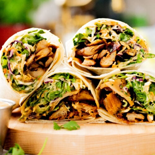 These Vegan Peanut Chicken Wraps are filled with crispy vegan chicken, crunchy veggies and the BEST spicy peanut sauce | ThisSavoryVegan.com
