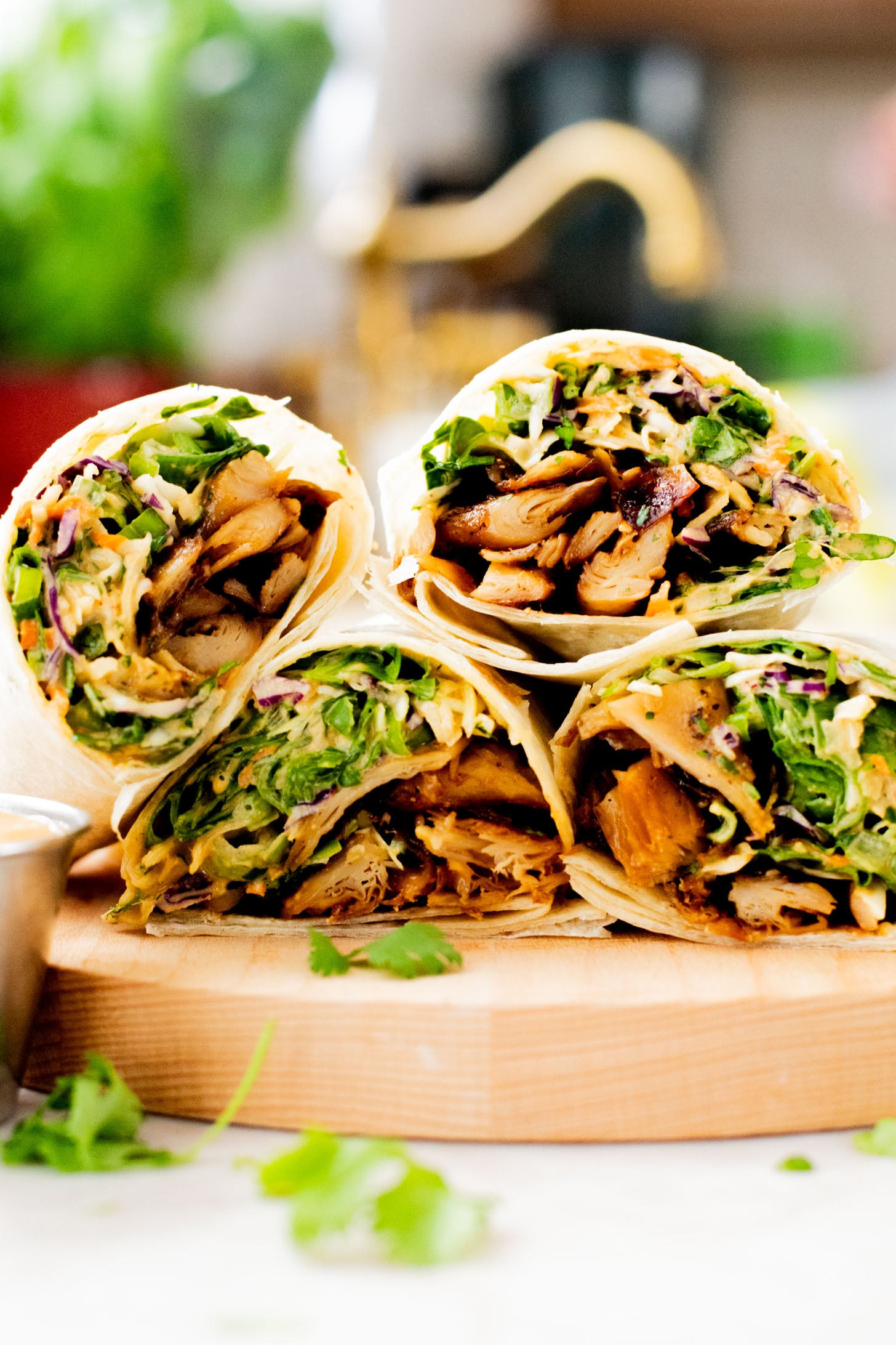 These Vegan Peanut Chicken Wraps are filled with crispy vegan chicken, crunchy veggies and the BEST spicy peanut sauce | ThisSavoryVegan.com