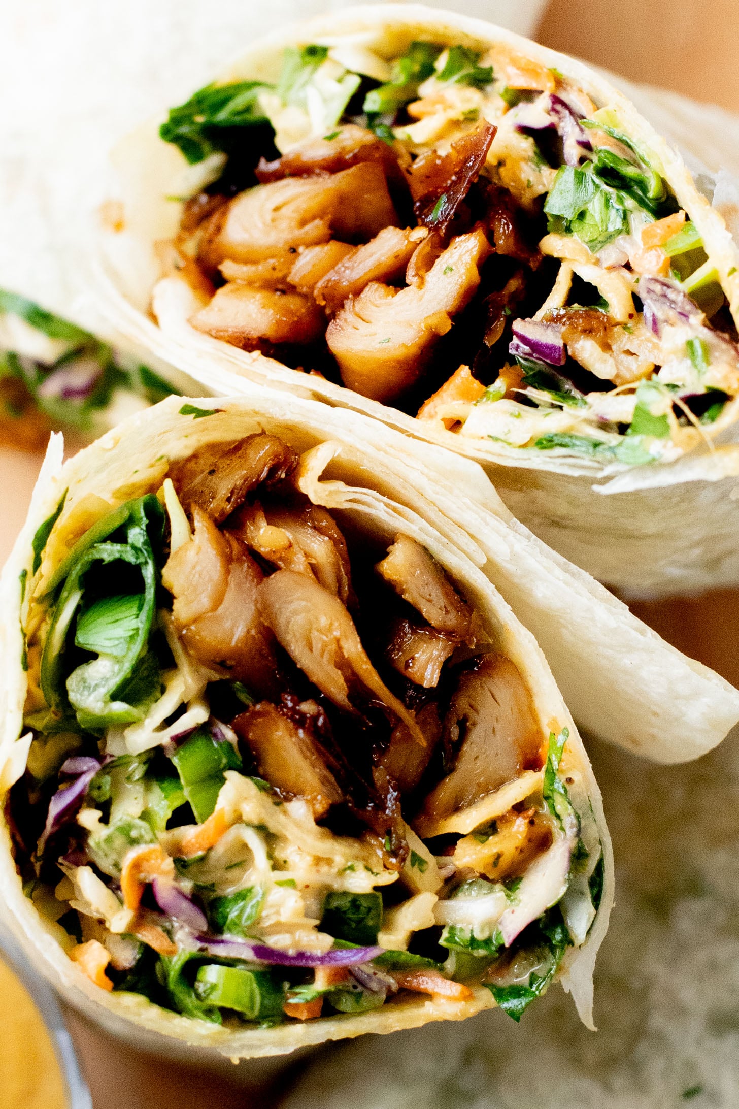 These Vegan Peanut Chicken Wraps are filled with crispy vegan chicken, crunchy veggies and the BEST spicy peanut sauce | ThisSavoryVegan.com