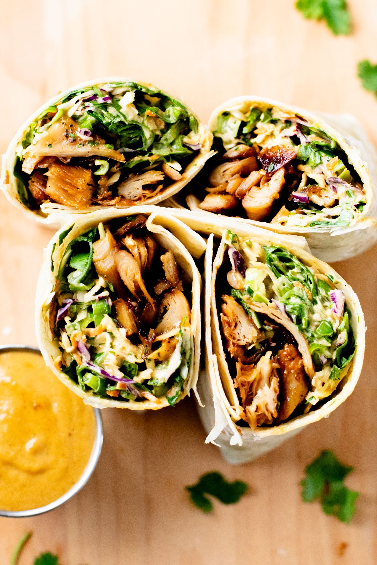 These Vegan Peanut Chicken Wraps are filled with crispy vegan chicken, crunchy veggies and the BEST spicy peanut sauce | ThisSavoryVegan.com