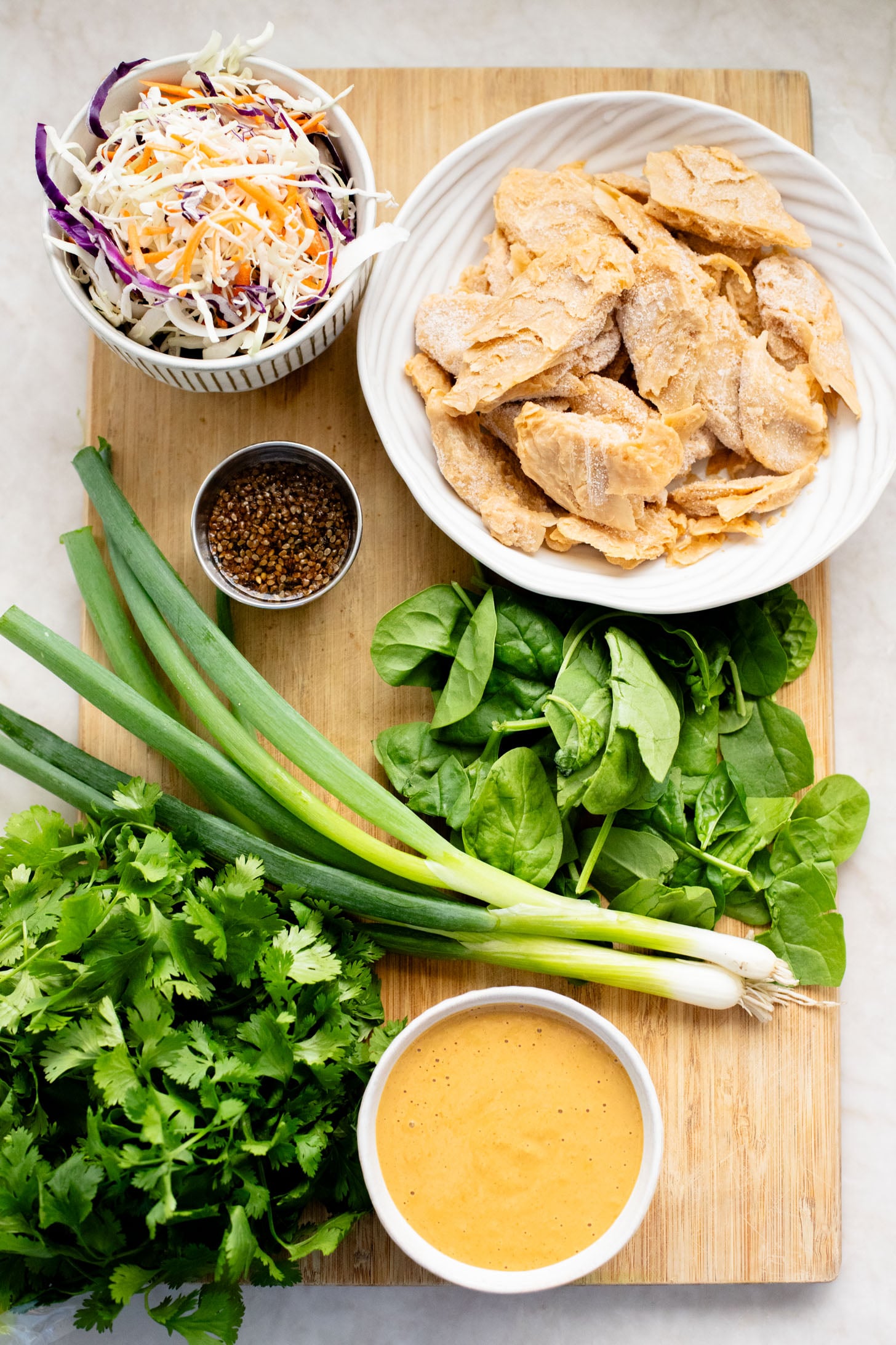 These Vegan Peanut Chicken Wraps are filled with crispy vegan chicken, crunchy veggies and the BEST spicy peanut sauce | ThisSavoryVegan.com