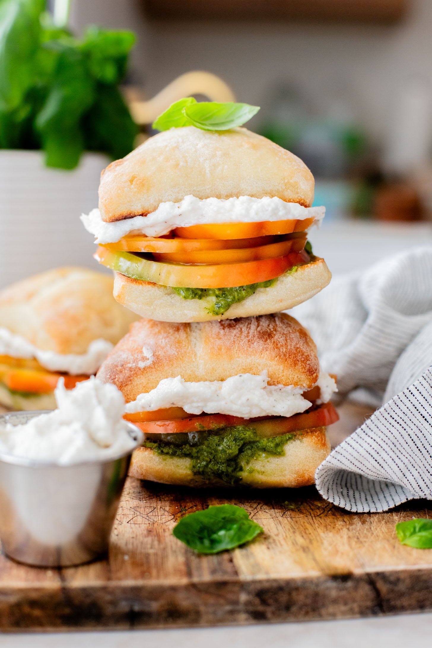 These Whipped Feta & Pesto Tomato Sandwiches are the perfect summer sammie! Made with dairy-free feta - the perfect way to use up summer tomatoes | ThisSavoryVegan.com