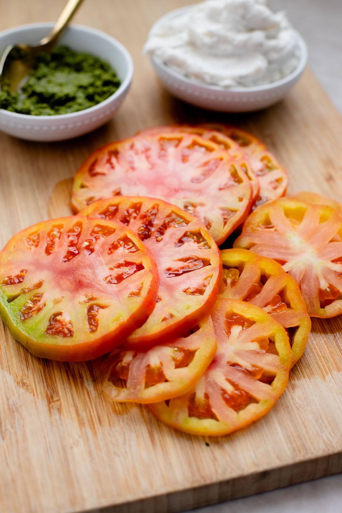 These Whipped Feta & Pesto Tomato Sandwiches are the perfect summer sammie! Made with dairy-free feta - the perfect way to use up summer tomatoes | ThisSavoryVegan.com