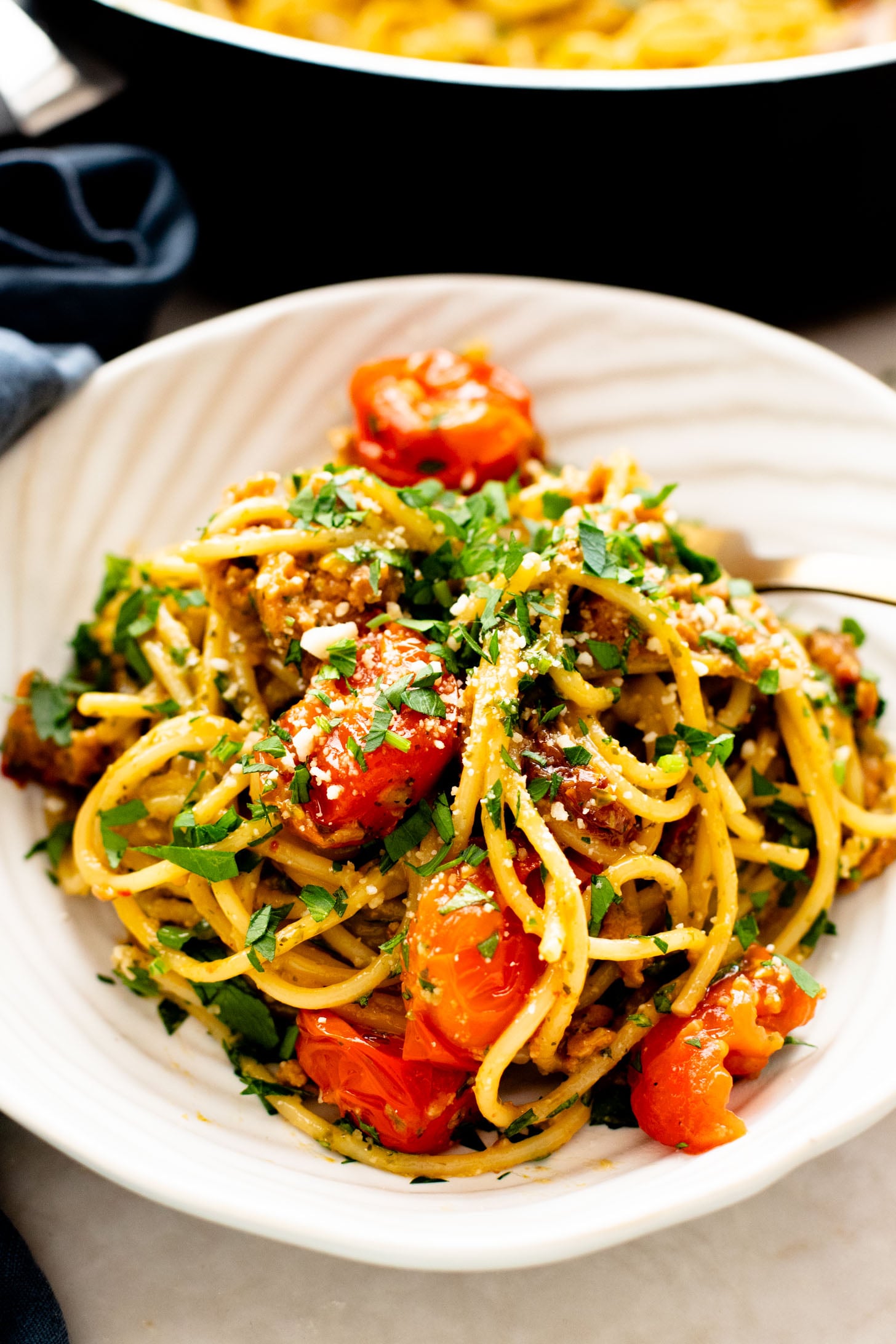 This One-Pot Vegan Sausage & Pesto Spaghetti is the perfect family dinner! Quick, easy and you only have one pan to wash | ThisSavoryVegan.com