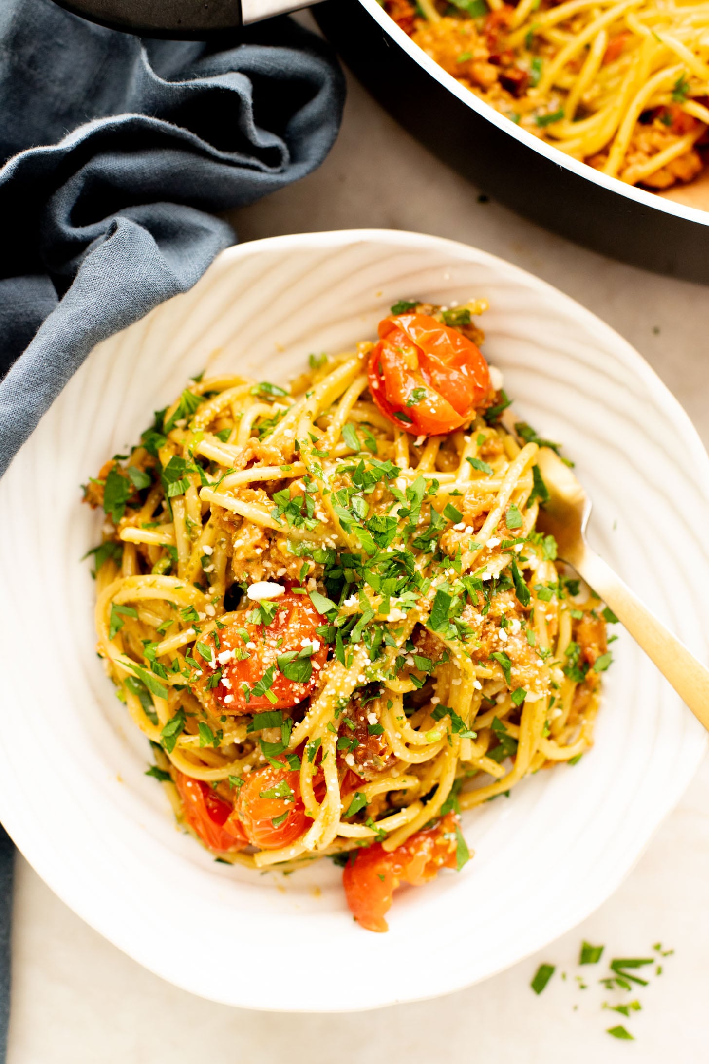 This One-Pot Vegan Sausage & Pesto Spaghetti is the perfect family dinner! Quick, easy and you only have one pan to wash | ThisSavoryVegan.com