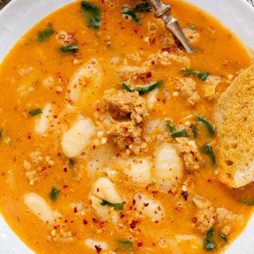 This Creamy Sausage & Gnocchi Soup is the perfect vegan soup. Simple ingredients and super comforting - perfect soup for the colder months | ThisSavoryVegan.com