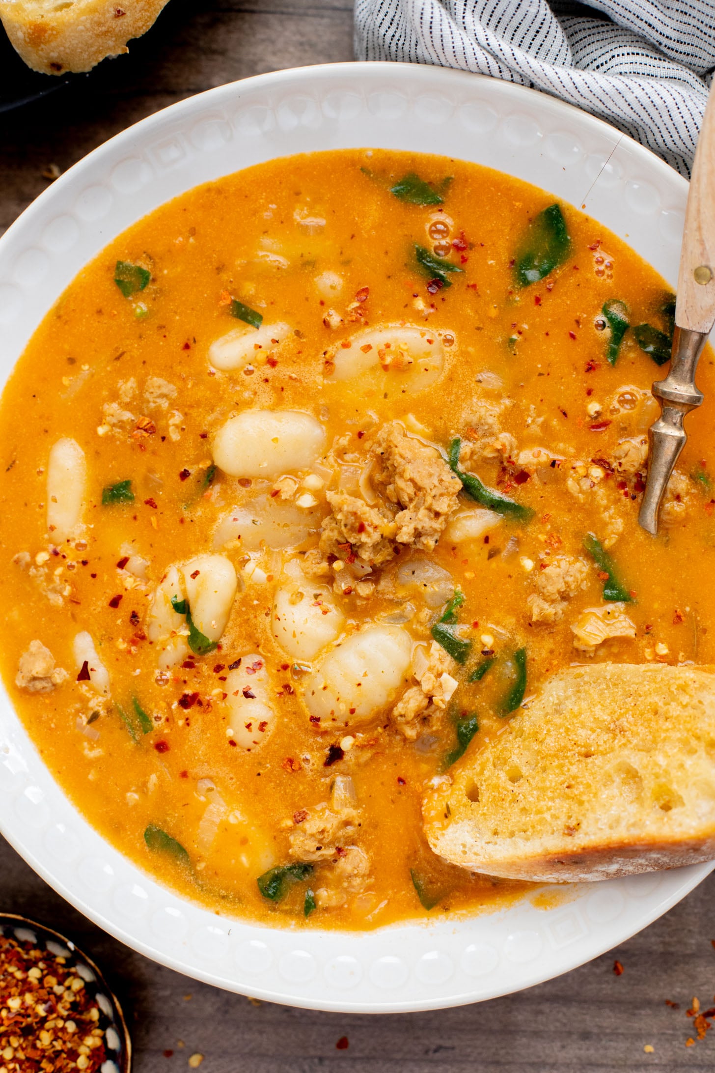 This Creamy Sausage & Gnocchi Soup is the perfect vegan soup. Simple ingredients and super comforting - perfect soup for the colder months | ThisSavoryVegan.com