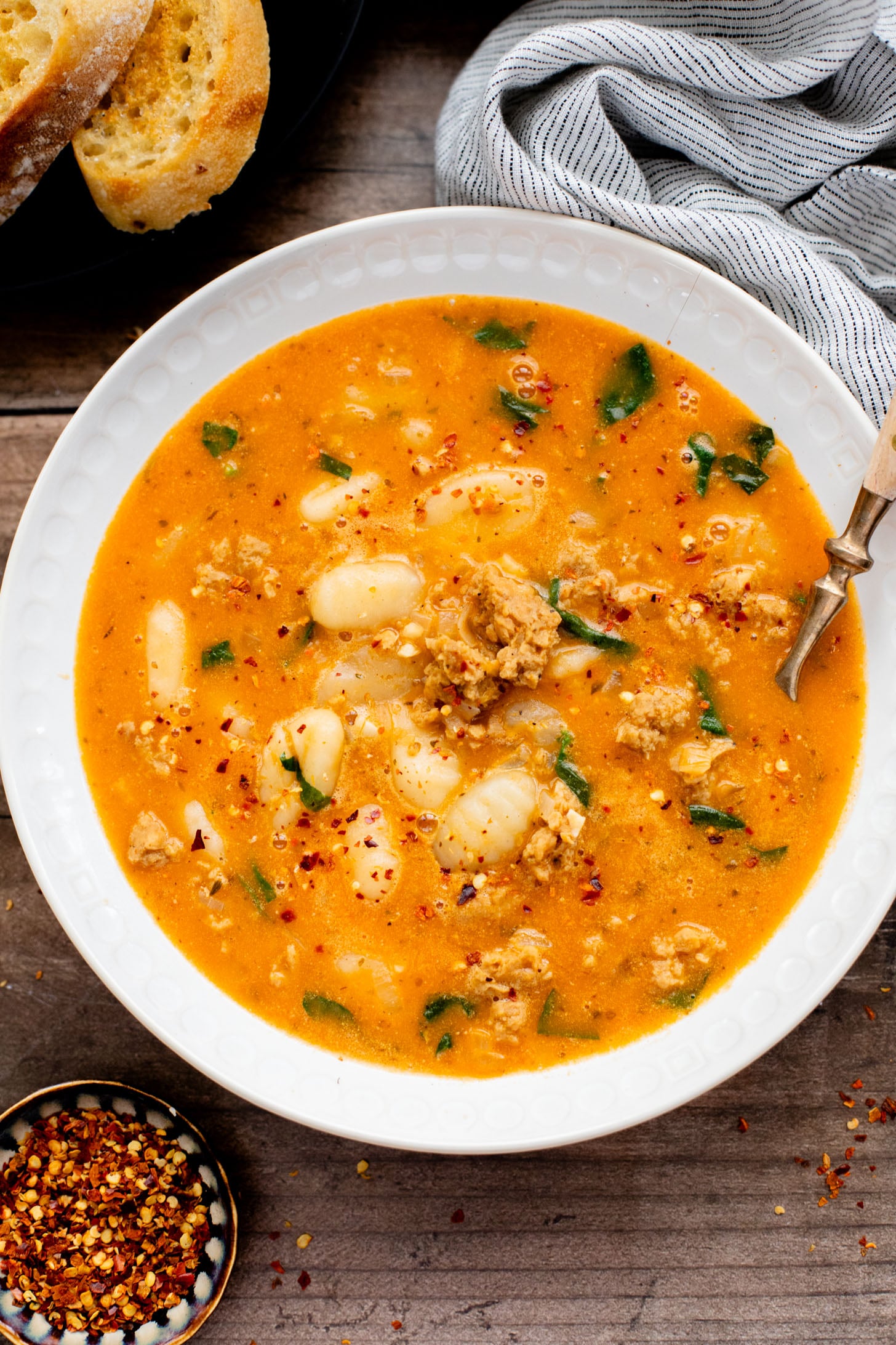 This Creamy Sausage & Gnocchi Soup is the perfect vegan soup. Simple ingredients and super comforting - perfect soup for the colder months | ThisSavoryVegan.com