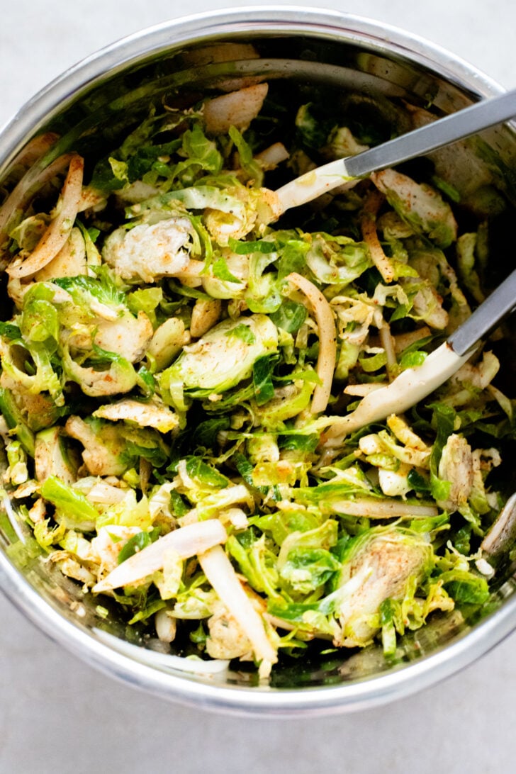 This Sheet Pan Brussels Sprouts & Sausage recipe is the perfect vegan fall dinner. The brussels sprouts are crispy, the vegan sausage is charred and delicious | ThisSavoryVegan.com